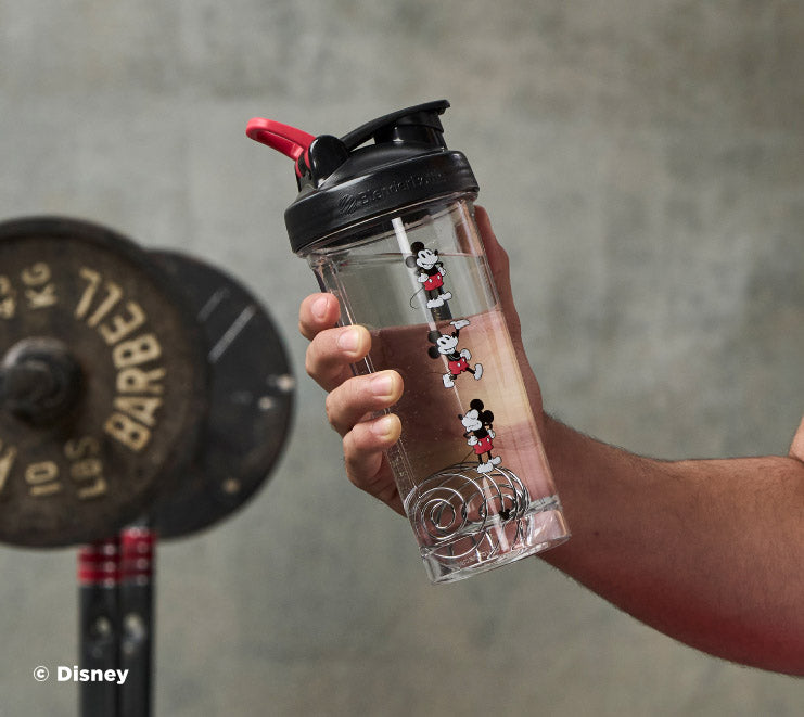 pro-series-x3 Mickey_Mouse_Protein_Shaker_Bottle_Being_Held_In_the_Gym.jpg